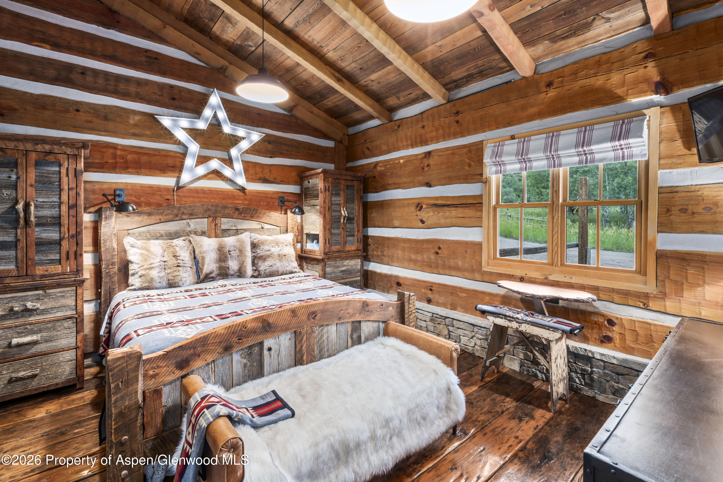 1350 Old Herron Road Basalt, CO 81621 - Photo 27 of 81 a bedroom with furniture and a large window