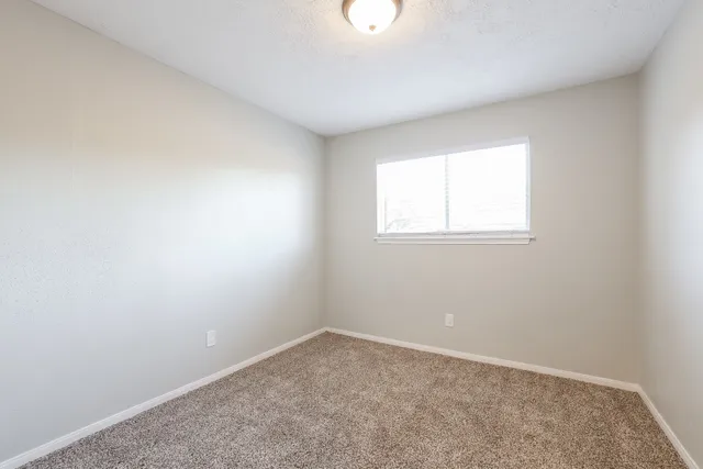 an empty room with a window