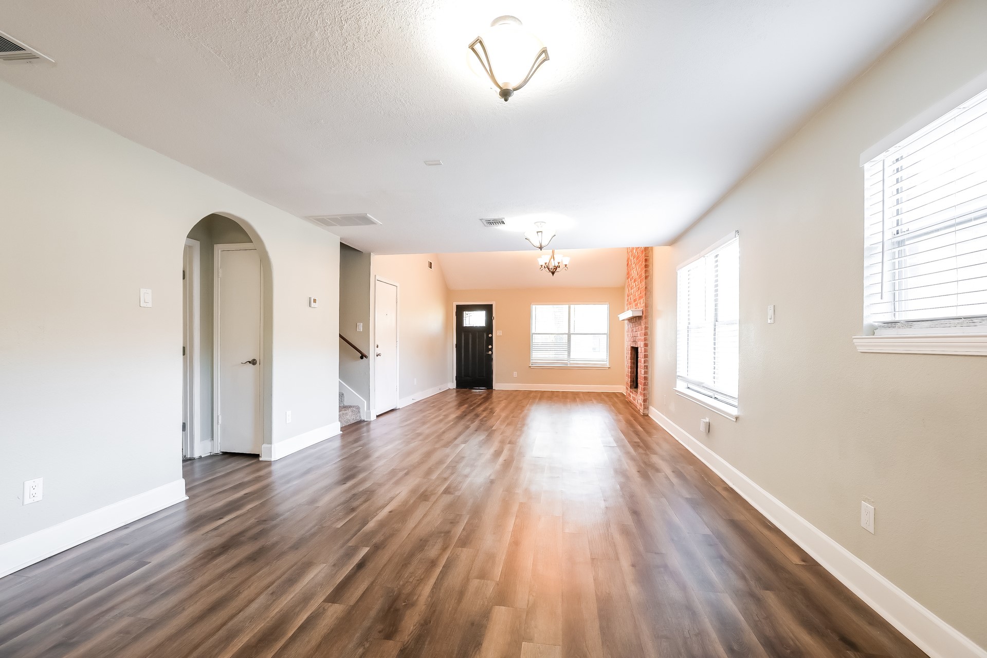 22826 Provincial Boulevard Katy, TX 77450 - Photo 3 of 18 a view of empty room with wooden floor and fan