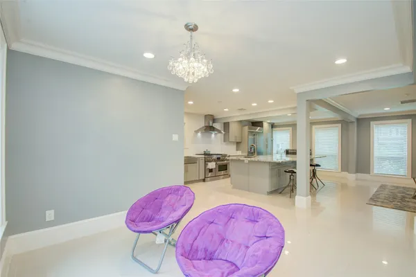 a view of kitchen with dining table and chairs