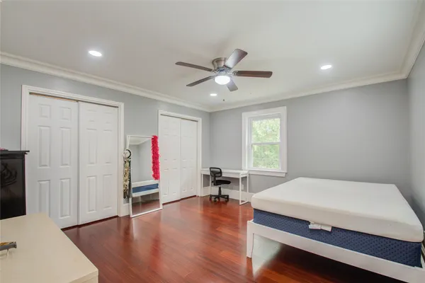 a bed room with a bed and furniture