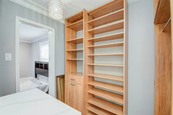 a room with a furniture and front door