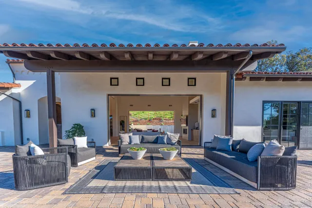 a view of a living room and dining room