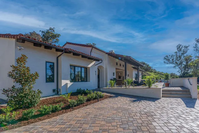 a view of a patio with swimming pool