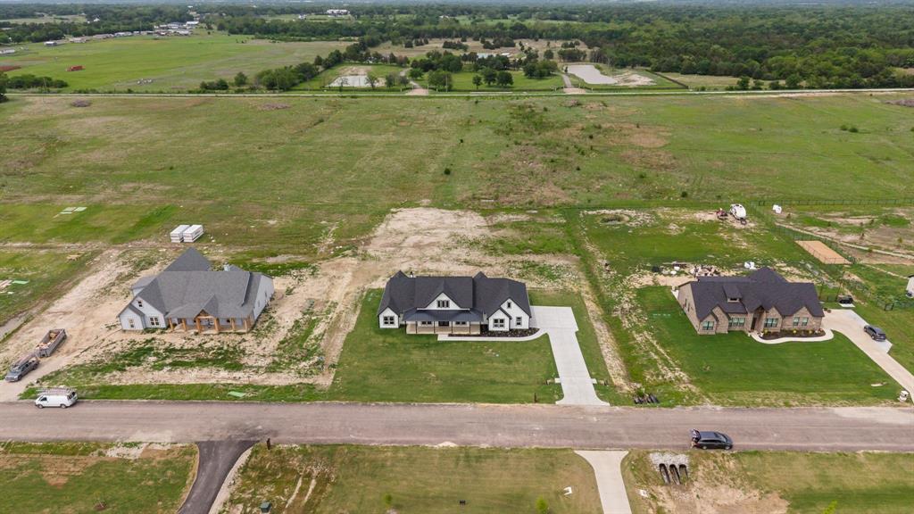 3093 Willow Road Celeste, TX 75423 - Photo 5 of 40 a view of a lake with a houses
