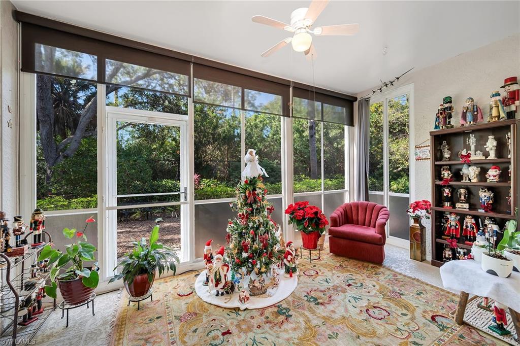 3755 Fieldstone Boulevard, Unit 1203 Naples, FL 34109 - Photo 27 of 50 a view of a dining room with furniture window and outside view