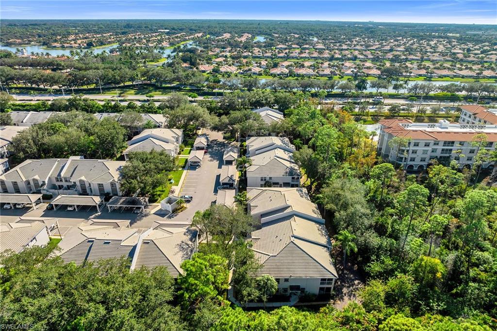 3755 Fieldstone Boulevard, Unit 1203 Naples, FL 34109 - Photo 48 of 50 an aerial view of multiple house