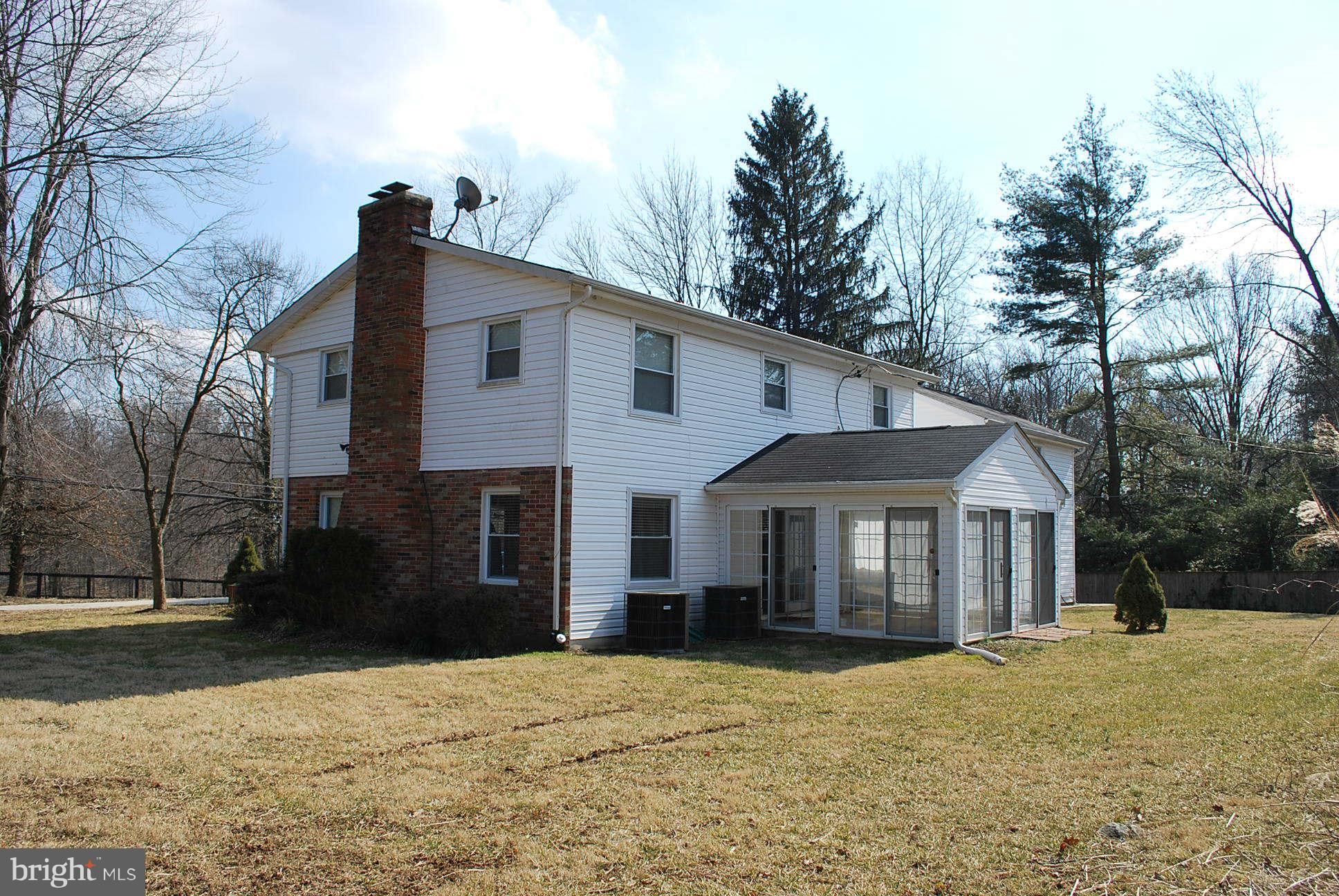 334 Old Joppa Road Fallston, MD 21047 - Photo 2 of 20 a front view of a house with a yard