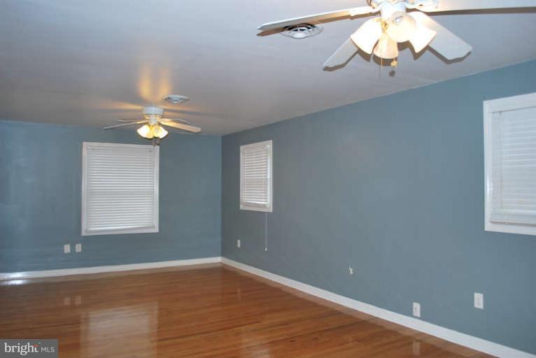 334 Old Joppa Road Fallston, MD 21047 - Photo 14 of 20 a view of a room with a chandelier fan and a window