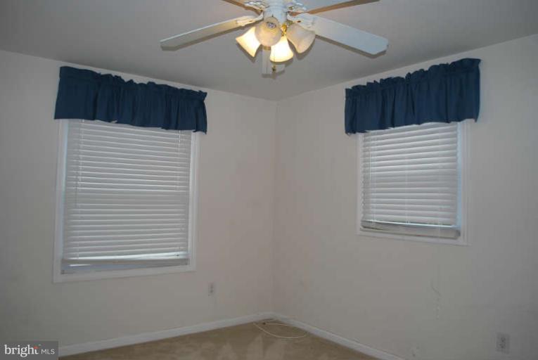 334 Old Joppa Road Fallston, MD 21047 - Photo 15 of 20 en empty room with a window and a fan