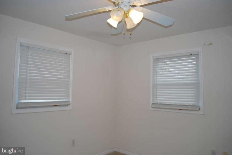 334 Old Joppa Road Fallston, MD 21047 - Photo 16 of 20 a view of a chandelier fan and window in a room