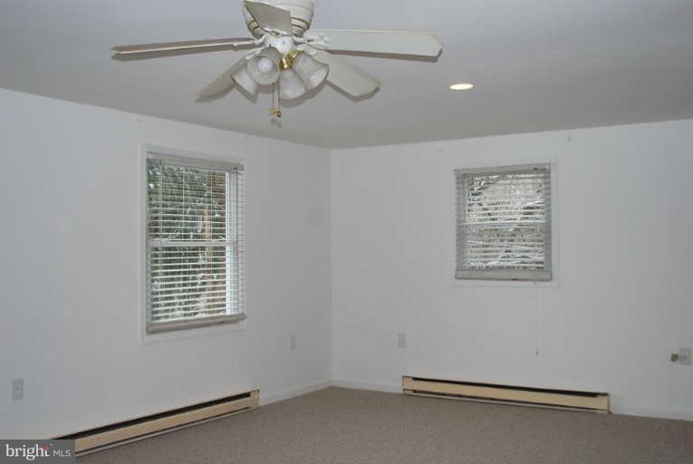 334 Old Joppa Road Fallston, MD 21047 - Photo 20 of 20 a view of a room with a ceiling fan and a window