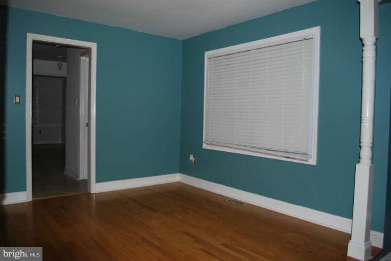 334 Old Joppa Road Fallston, MD 21047 - Photo 9 of 20 an empty room with wooden floor closet and windows