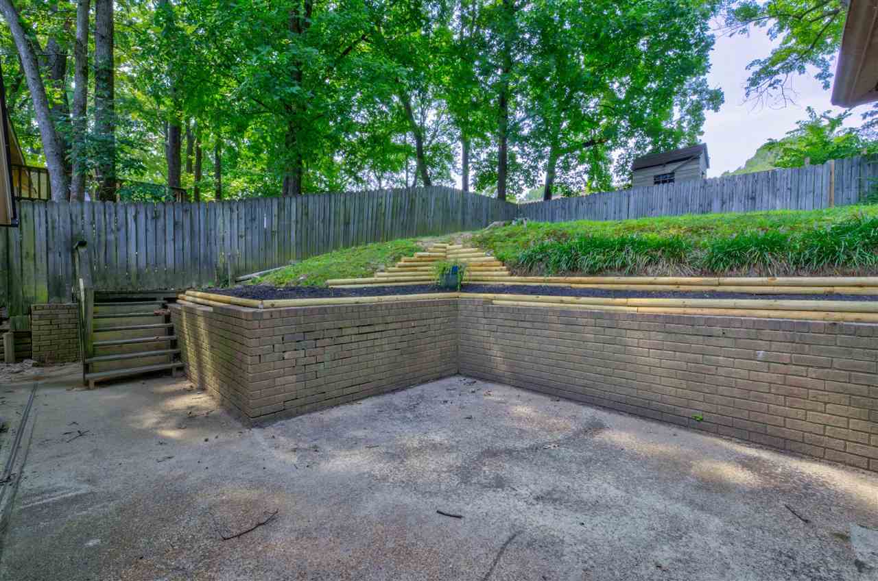 7024 Rockingham Road Memphis, TN 38125 - Photo 16 of 18 a view of outdoor space and yard