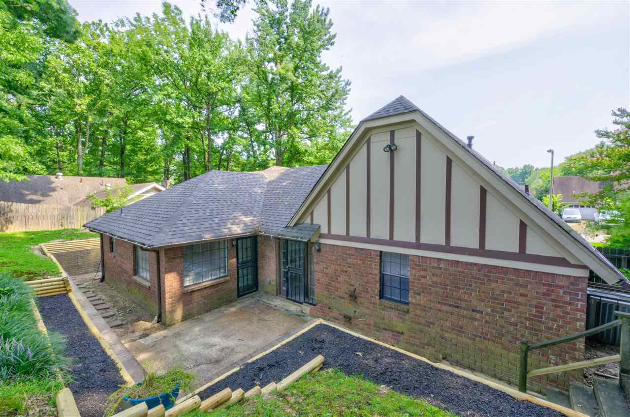 7024 Rockingham Road Memphis, TN 38125 - Photo 17 of 18 a aerial view of a house next to a yard