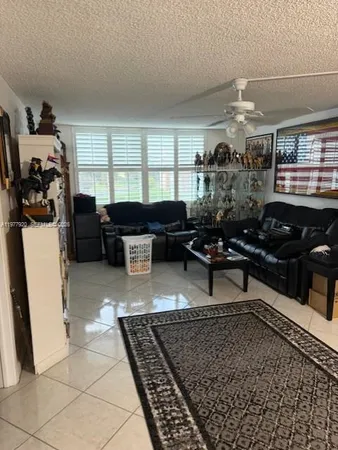 $150,000 | 6570 Royal Palm Boulevard, Unit 215J, Margate, FL 33063