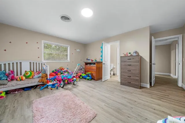a kids room with toys and toys