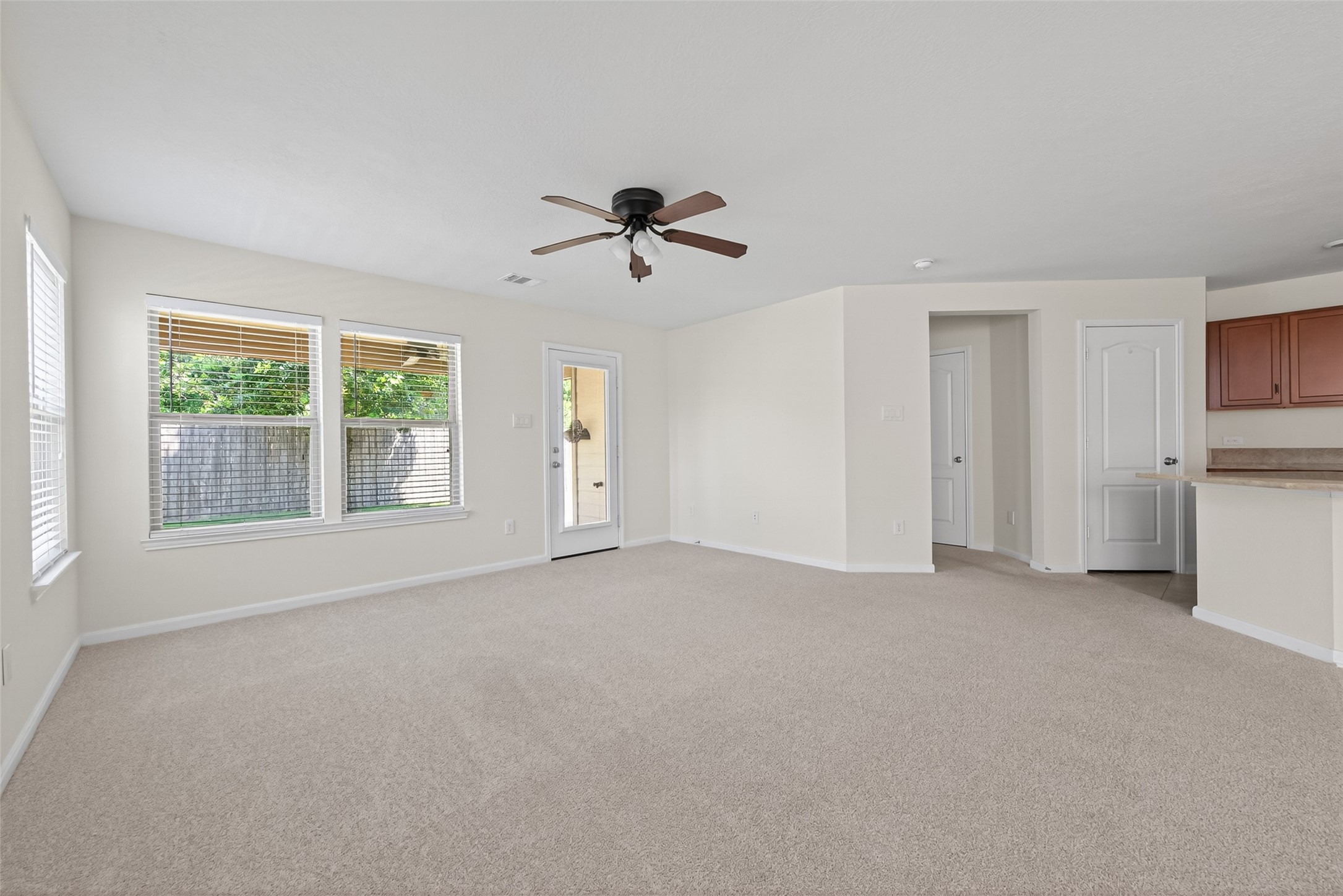 2754 Cayden Creek Way Conroe, TX 77304 - Photo 8 of 40 a view of empty room with ceiling fan
