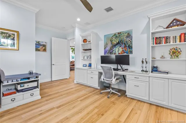 a bedroom with a bed and a table in it