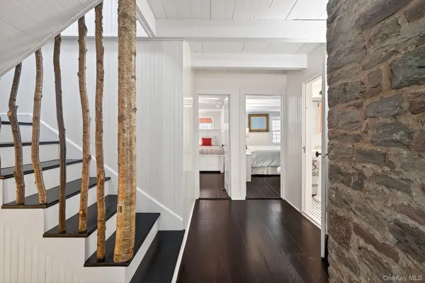 a view of entryway with wooden floor