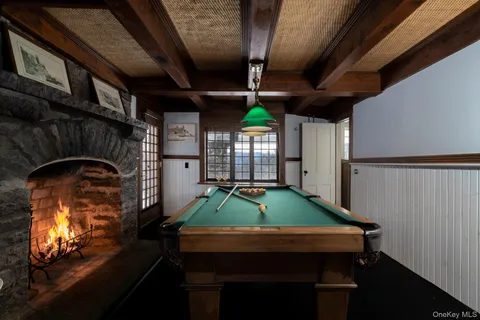 a view of room with window and wooden floor