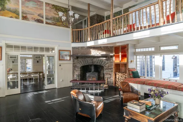 a living room with furniture or fireplace and a floor to ceiling window