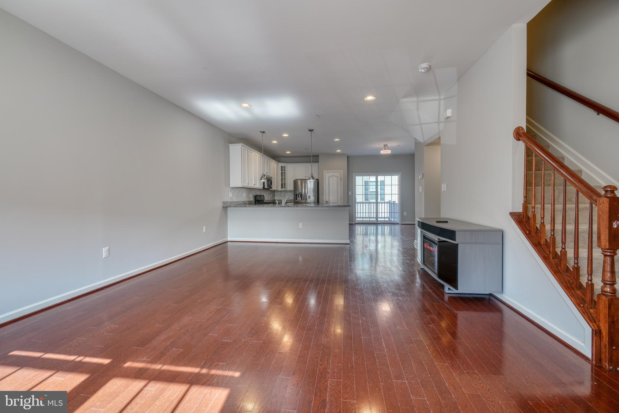 985 Morgan Run Road Middle River, MD 21220 - Photo 9 of 33 a view of a kitchen and wooden floor