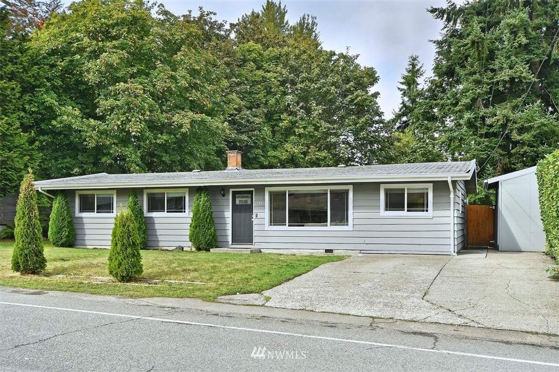 11446 Southeast 182nd Street Renton, WA 98055 - Photo 1 of 1 front view of a house next to a yard