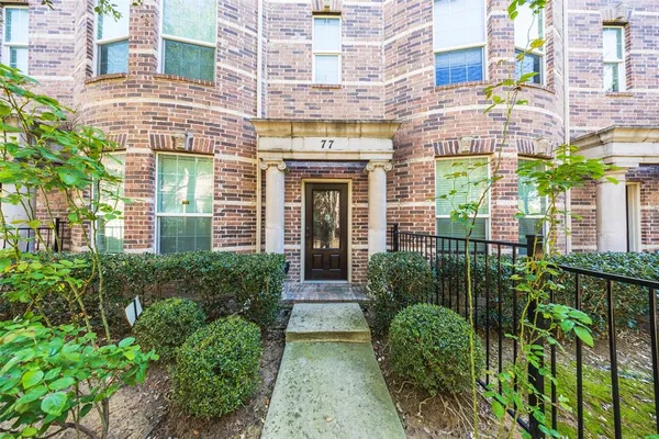 a view of a building with garden