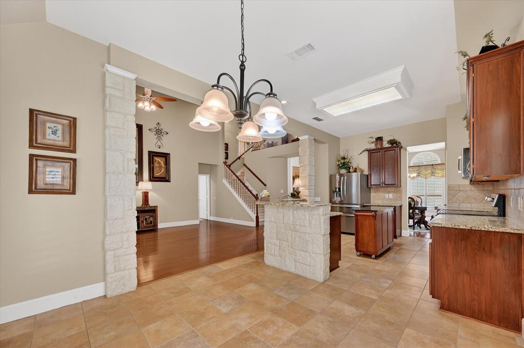 1371 San Rafael Drive Rockwall, TX 75087 - Photo 19 of 35 a view of a livingroom with furniture and stairs