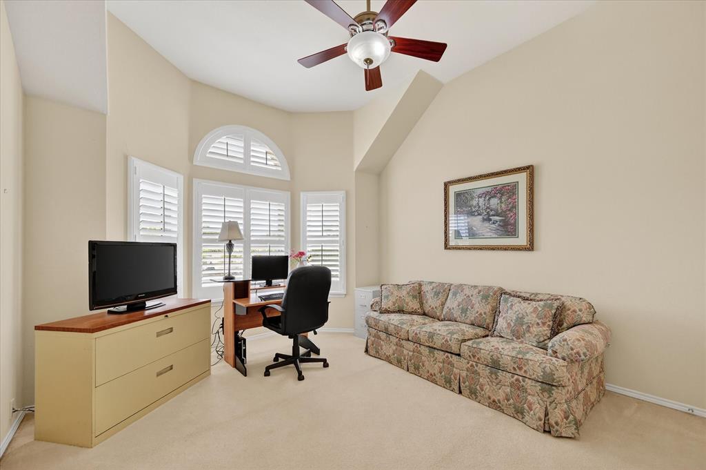 1371 San Rafael Drive Rockwall, TX 75087 - Photo 30 of 35 a view of a livingroom with workspace and a window