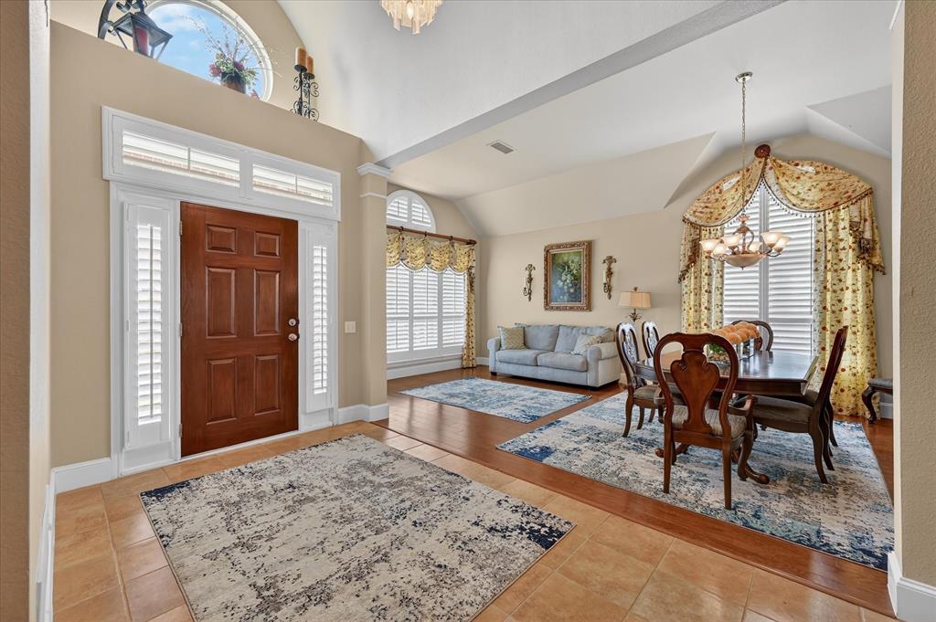 1371 San Rafael Drive Rockwall, TX 75087 - Photo 5 of 35 a view of a livingroom with furniture window and wooden floor