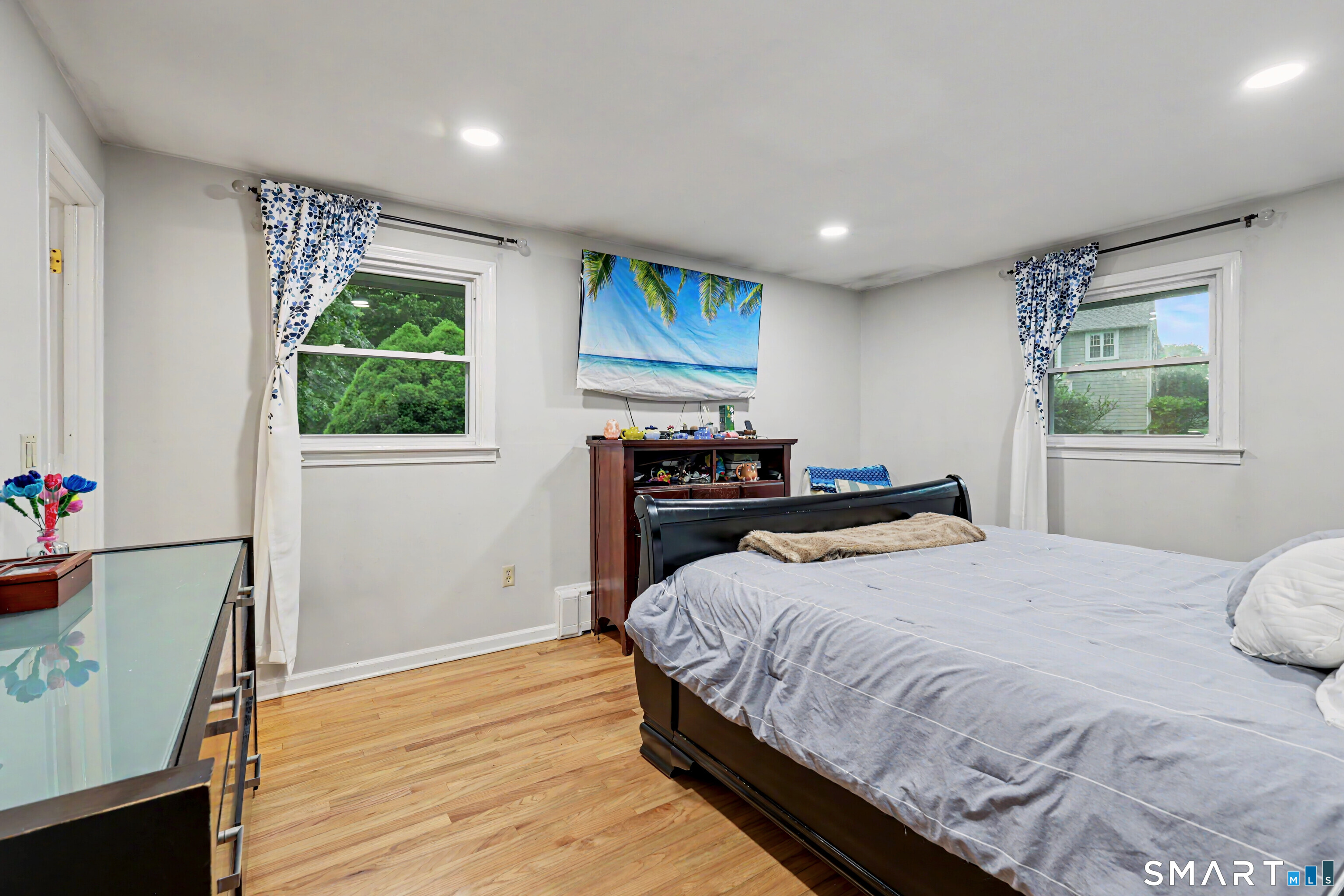 44 Haverhill Road Trumbull, CT 06611 - Photo 15 of 32 a bedroom with a bed and wooden floor