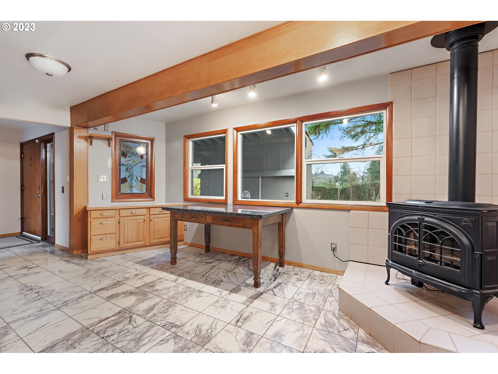 2435 Southwest Dakota Street Portland, OR 97239 - Photo 24 of 47 a bedroom with furniture and a window