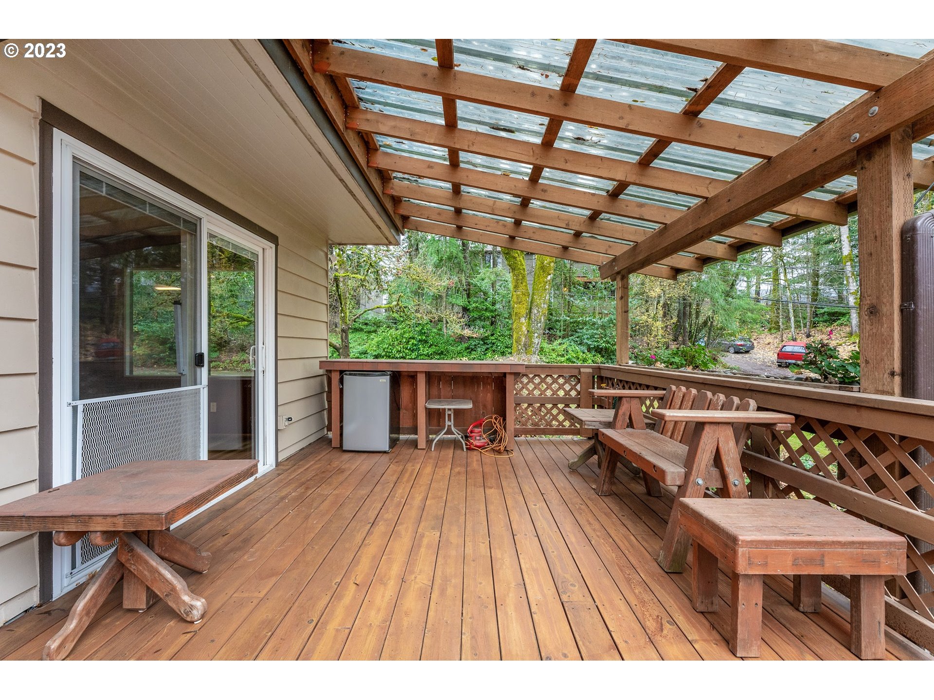 2435 Southwest Dakota Street Portland, OR 97239 - Photo 27 of 47 a balcony with furniture and wooden floor