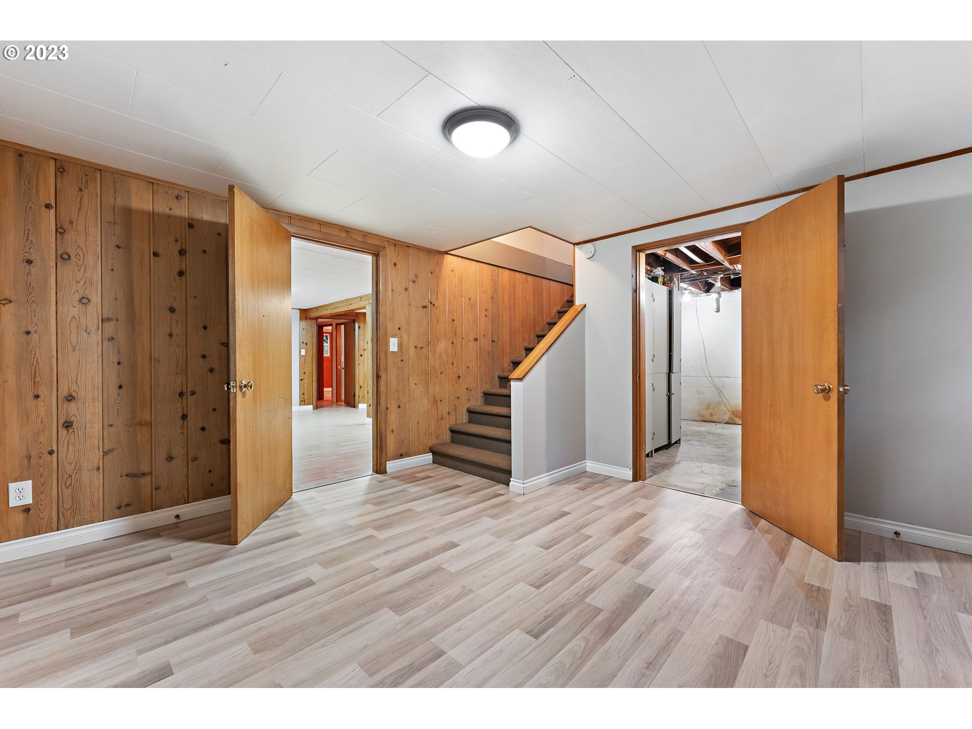 2435 Southwest Dakota Street Portland, OR 97239 - Photo 39 of 47 a view of an empty room with wooden floor