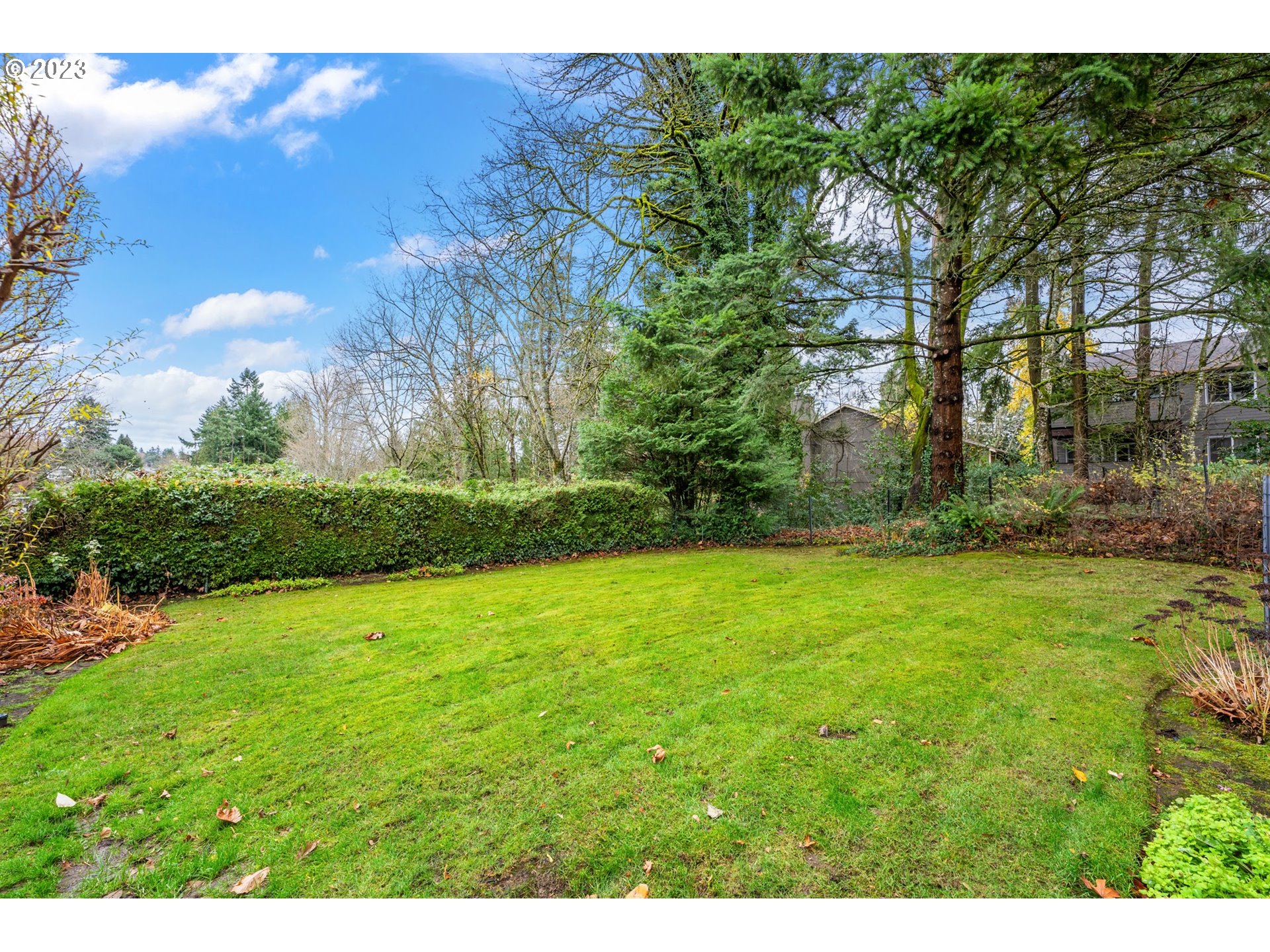 2435 Southwest Dakota Street Portland, OR 97239 - Photo 41 of 47 a view of a field of grass and trees