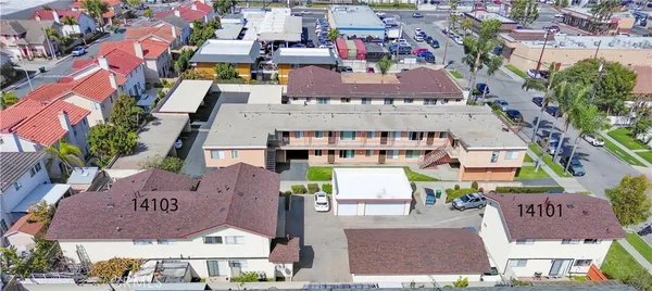 an aerial view of an buildings and street
