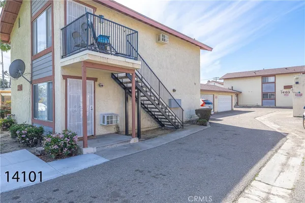 a view of a house with a garage