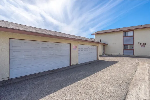 a view of a house with a garage