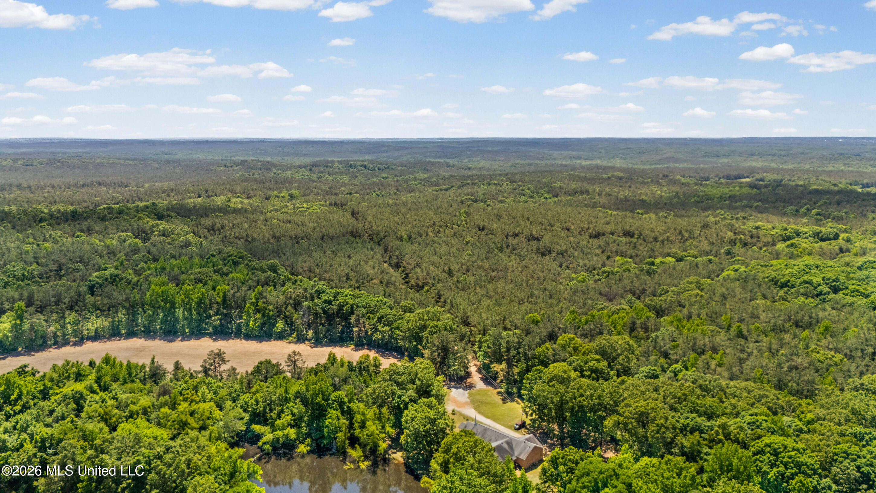 202 Powell Chapel Road Holly Springs, MS 38635 - Photo 17 of 59 dji_20260508135237_0078_d_print