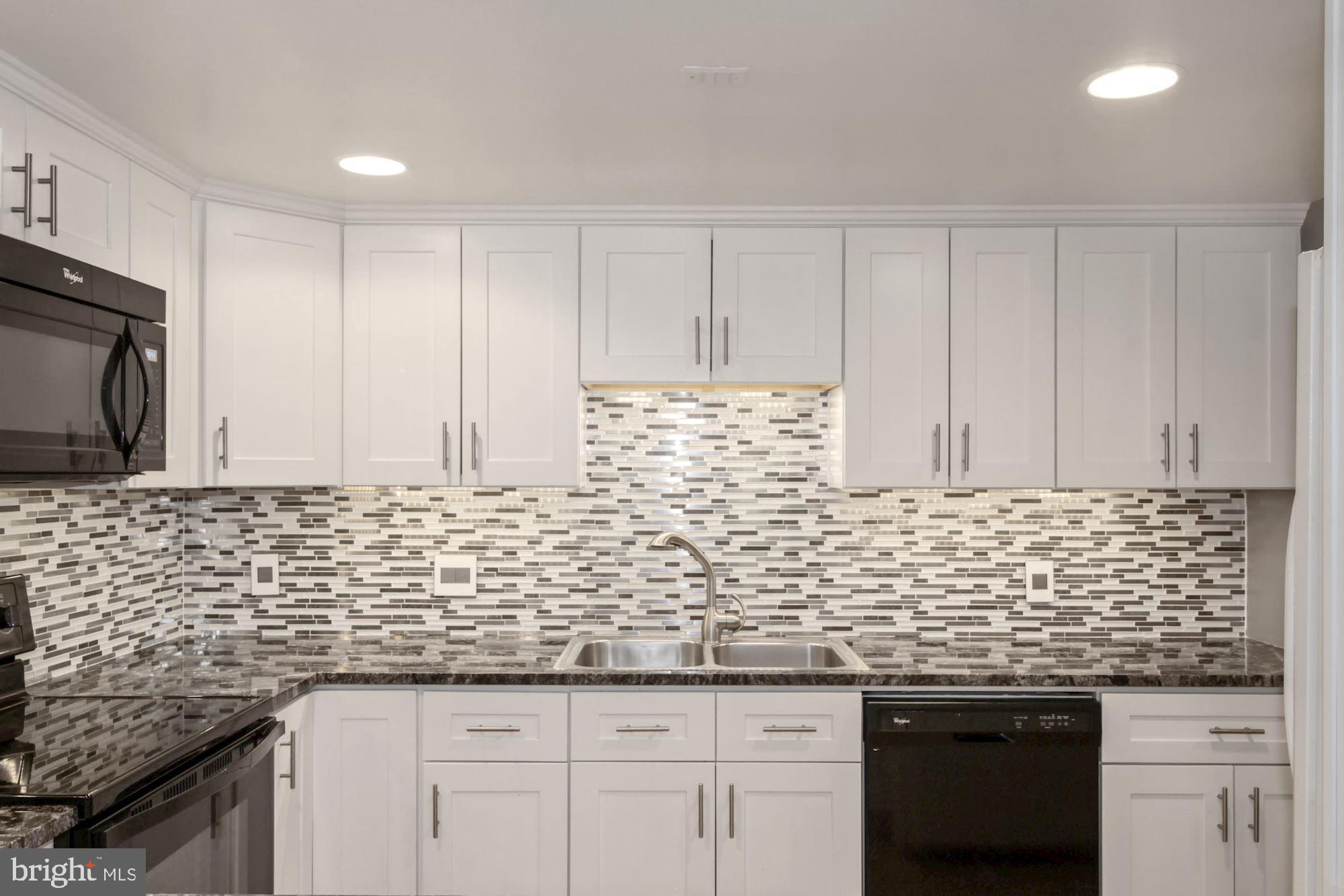 1040 Deer Ridge Drive, Unit 309 Baltimore, MD 21210 - Photo 1 of 31 Modern Kitchen with granite counter tops