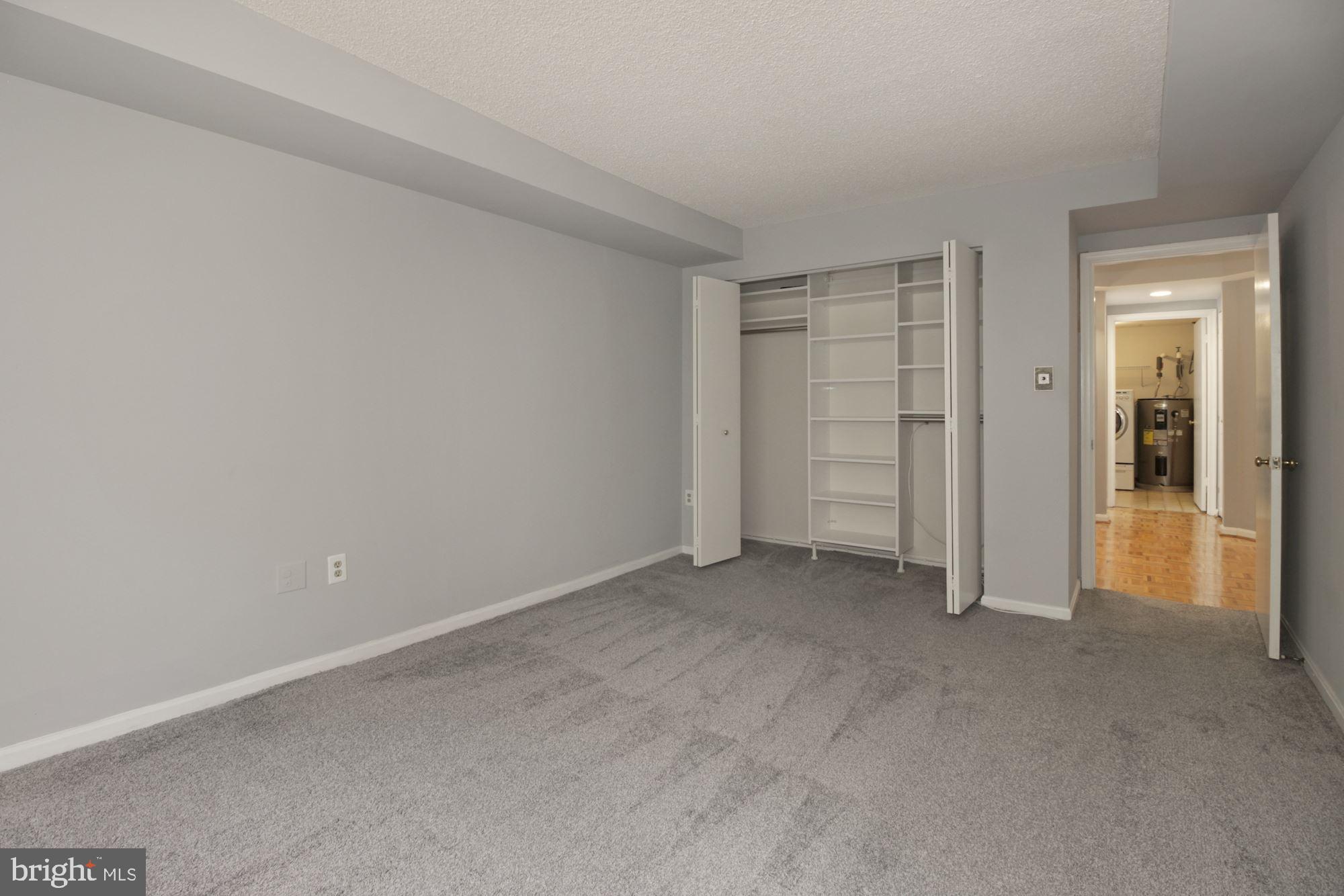 1040 Deer Ridge Drive, Unit 309 Baltimore, MD 21210 - Photo 12 of 31 Bedroom #2 with closet oranizers.
