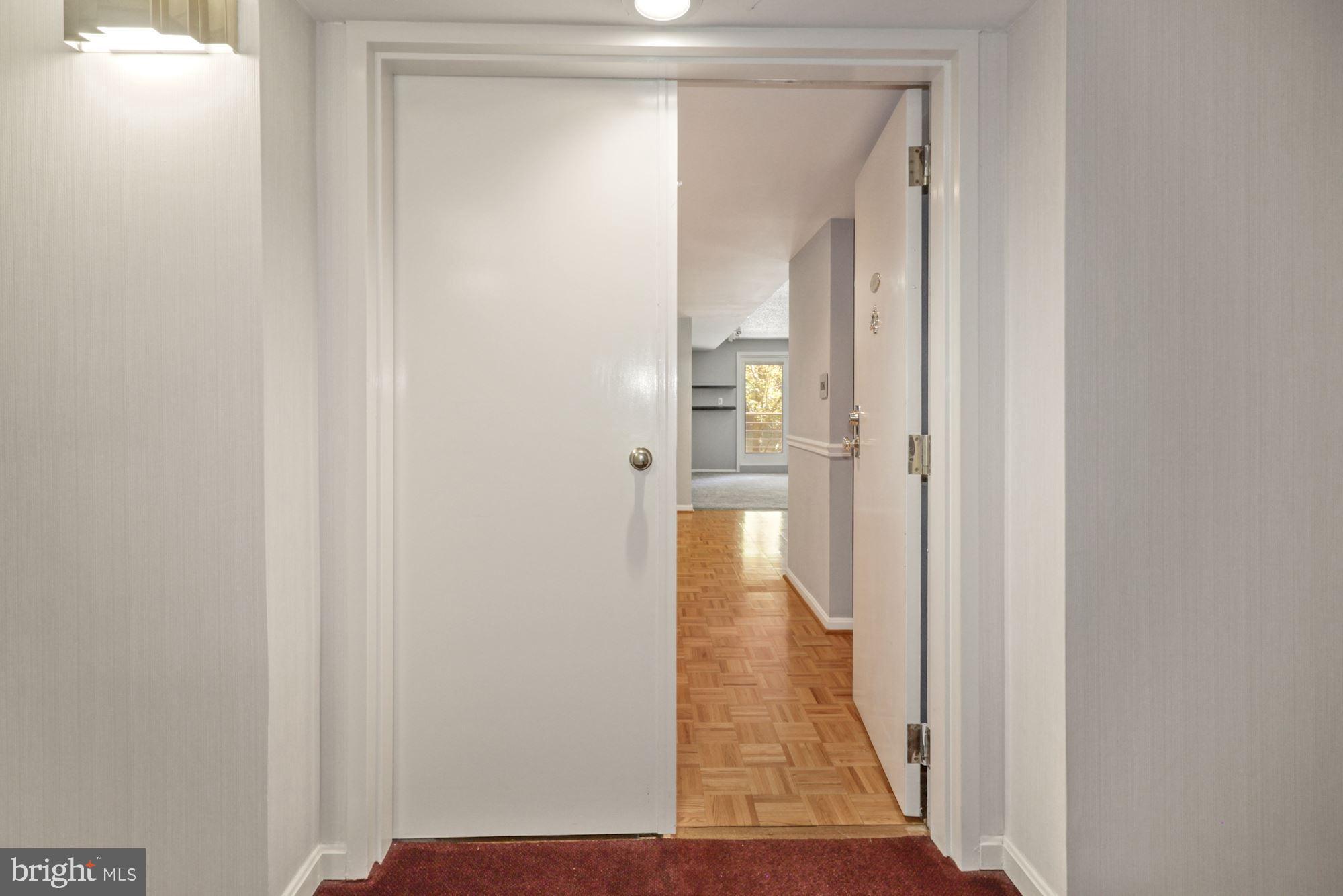 1040 Deer Ridge Drive, Unit 309 Baltimore, MD 21210 - Photo 27 of 31 Front entrance from hallway