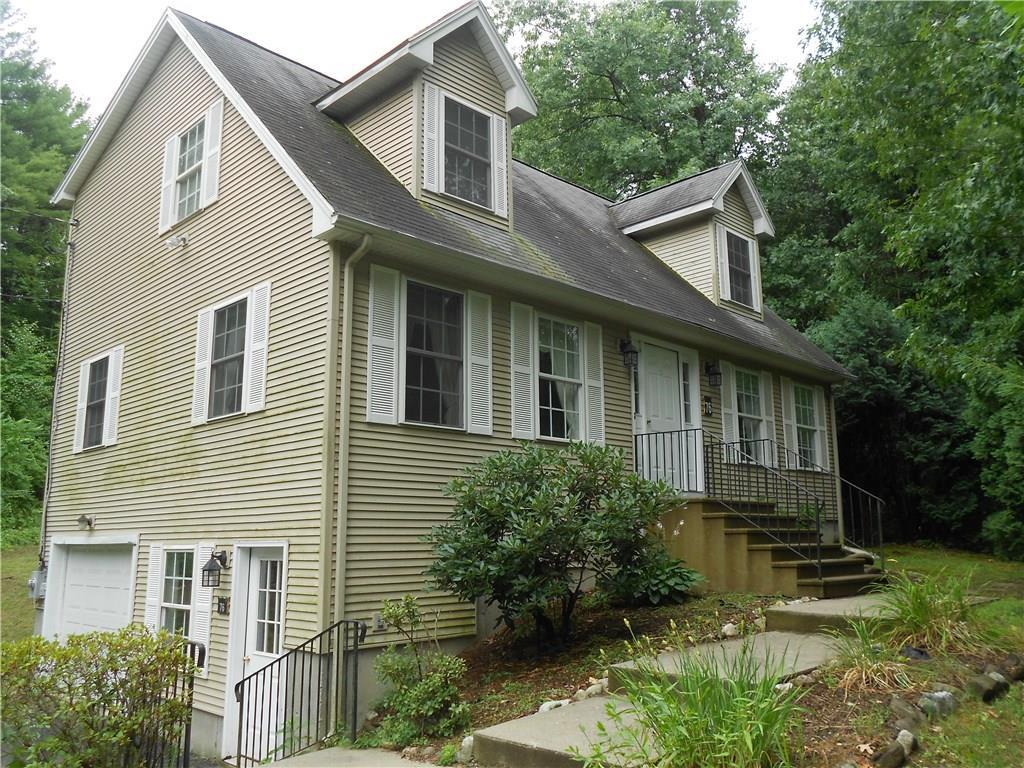 14 Cooke Road Somers, CT 06071 - Photo 1 of 1 a front view of a house with a yard