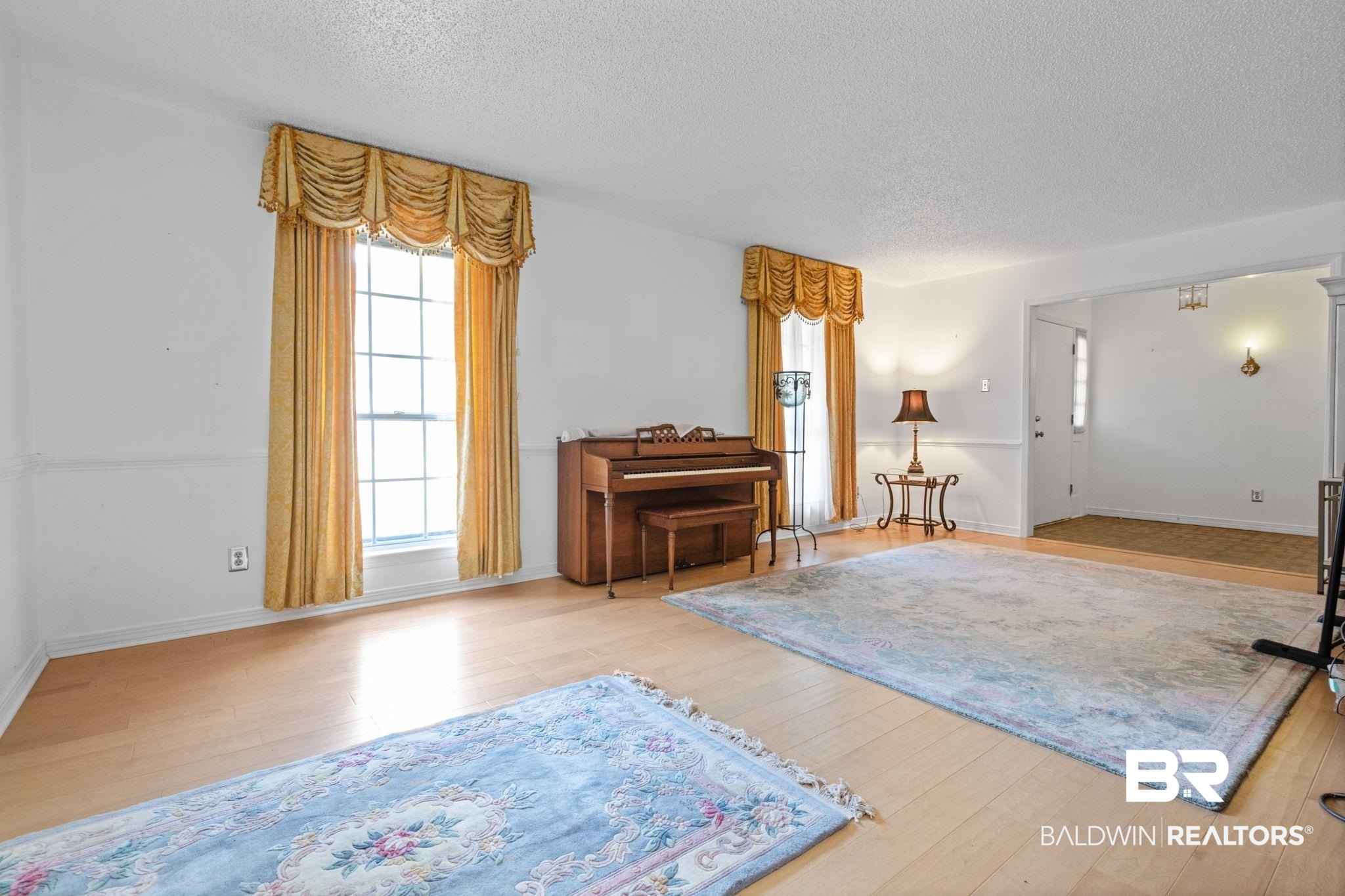 6261 Old Pascagoula Road Theodore, AL 36582 - Photo 11 of 29 Interior space with a textured ceiling and light wood-type flooring