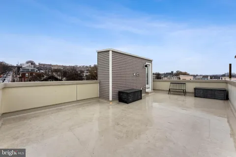 a view of terrace with a bench