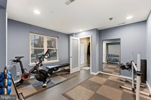 a view of a room with gym equipment