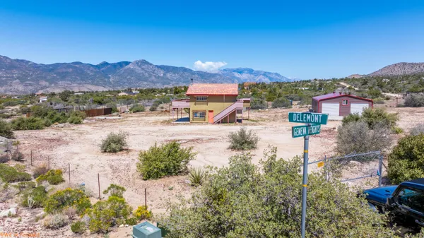 an aerial view of residential houses and outdoor space
