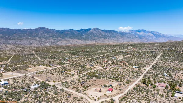 a view of a city with mountains in the background